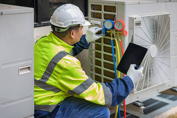 Professional Heat Pump Repair technician working in Neptune Beach, FL